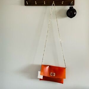 Anya Hindmarch Valorie Envelope Crossbody Bag in Orange Rubber